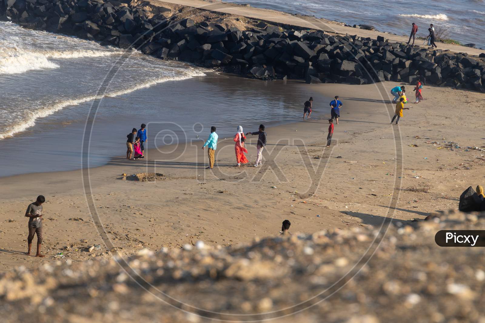 Chennai, Tamil Nadu, India - Pondycherry 21 02 2021: People On Beach Playing Near The Shore
