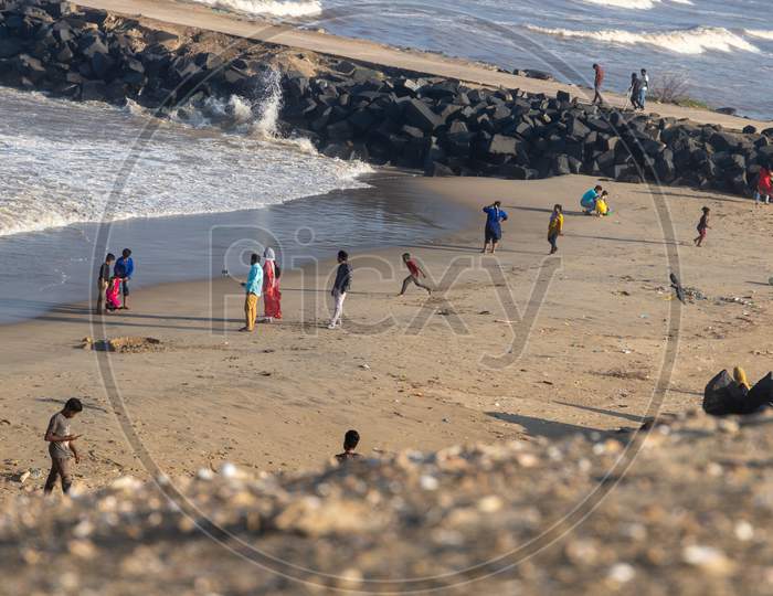 Chennai, Tamil Nadu, India - Pondycherry 21 02 2021: People Playing On Seashore In The Beach