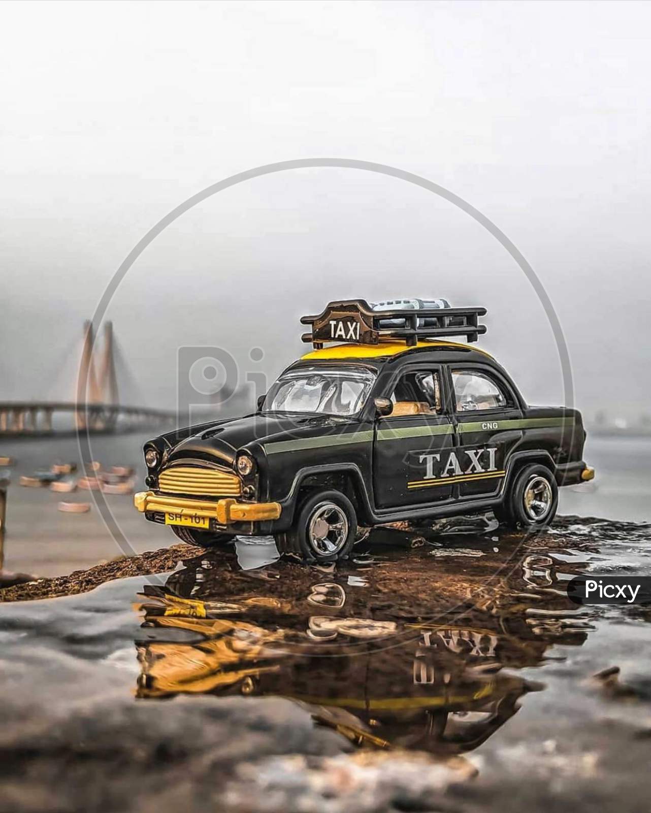 Side picture of toy taxi