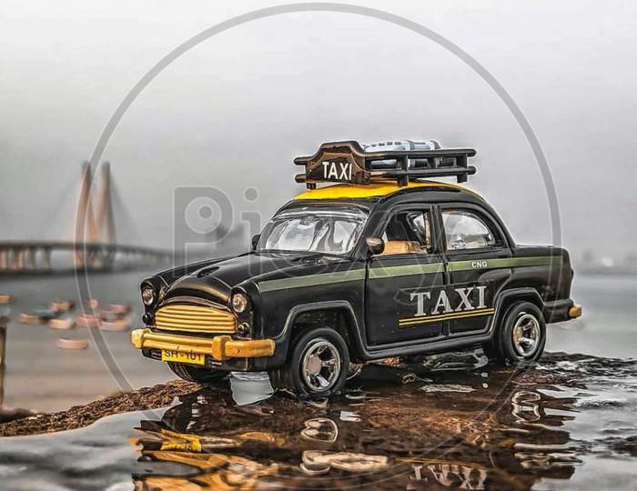 Side picture of toy taxi