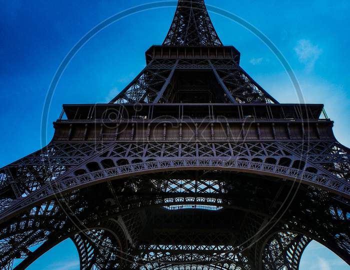 The Eiffel Tower And Blue Sky (Paris, France)