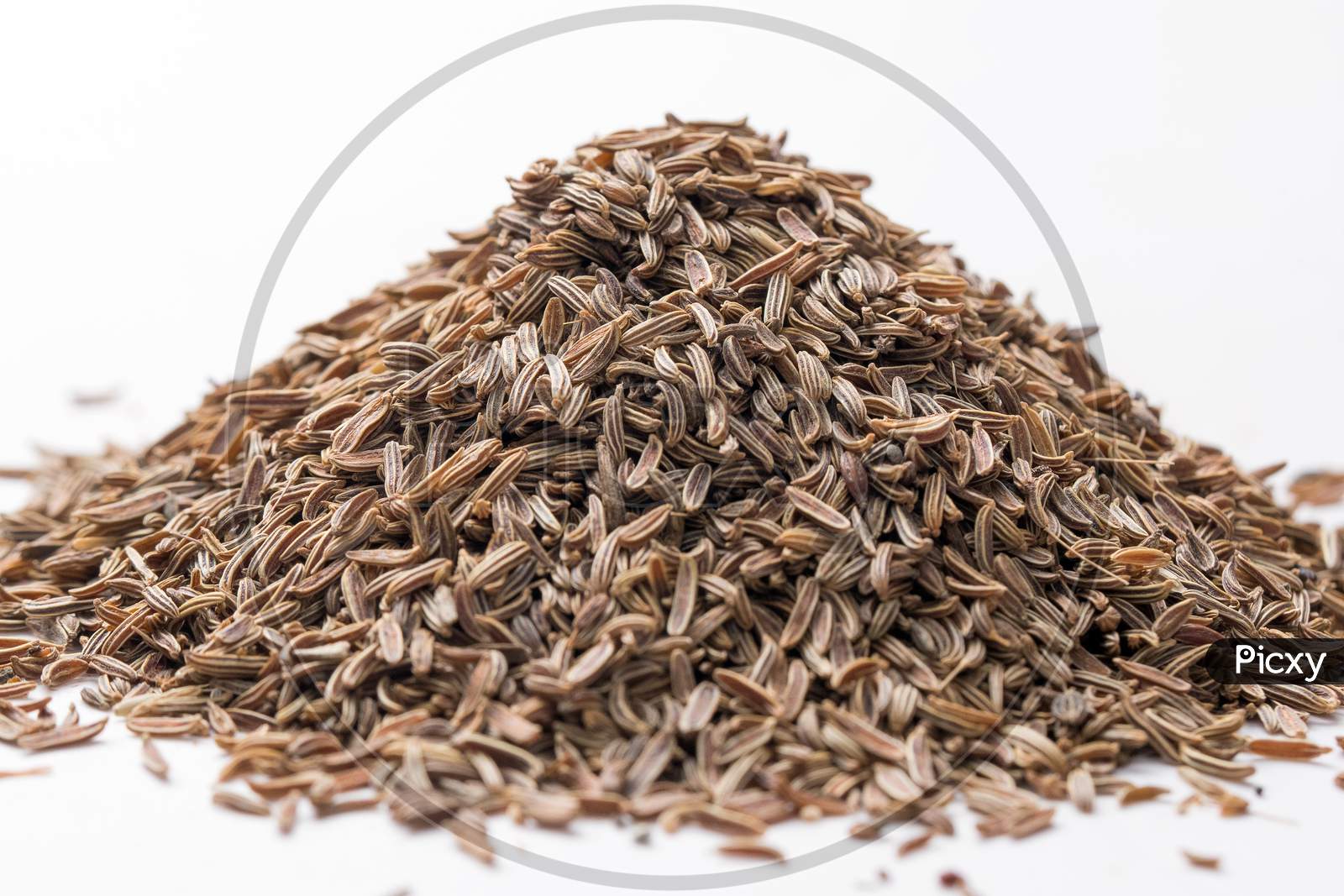 Image of Bitter Cumin (Cuminum Cyminum) Closeup Heap PileQG994394Picxy