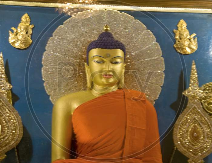 Smiling Face Of Buddha
