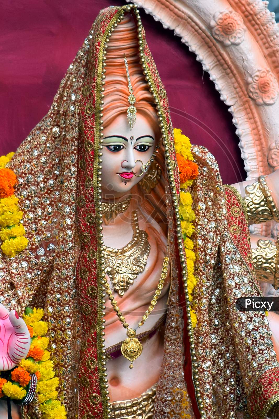 Sculpture Of Hindu Goddess Durga, Goddess Durga Idol With Ornaments In Close Up Side Face View