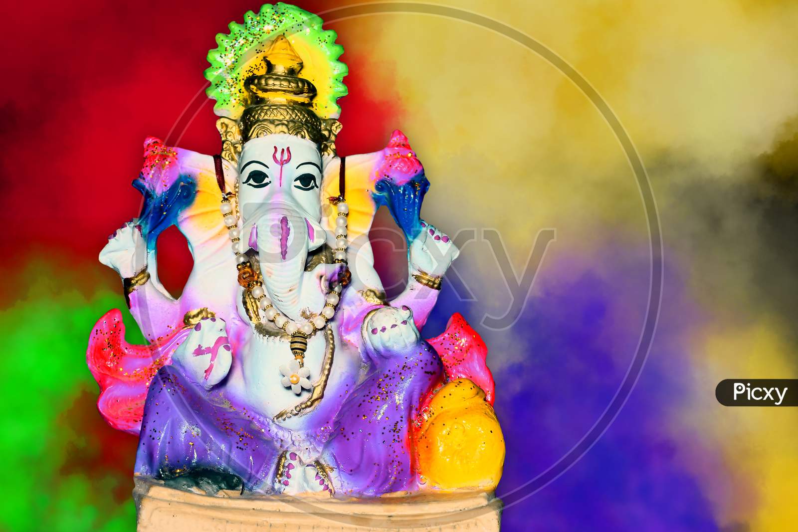 The Lord Of Ganesha. Lord Ganesha On Colorful Background, Hindu God Ganesha. Ganesha Colorful Idol. Indian Culture