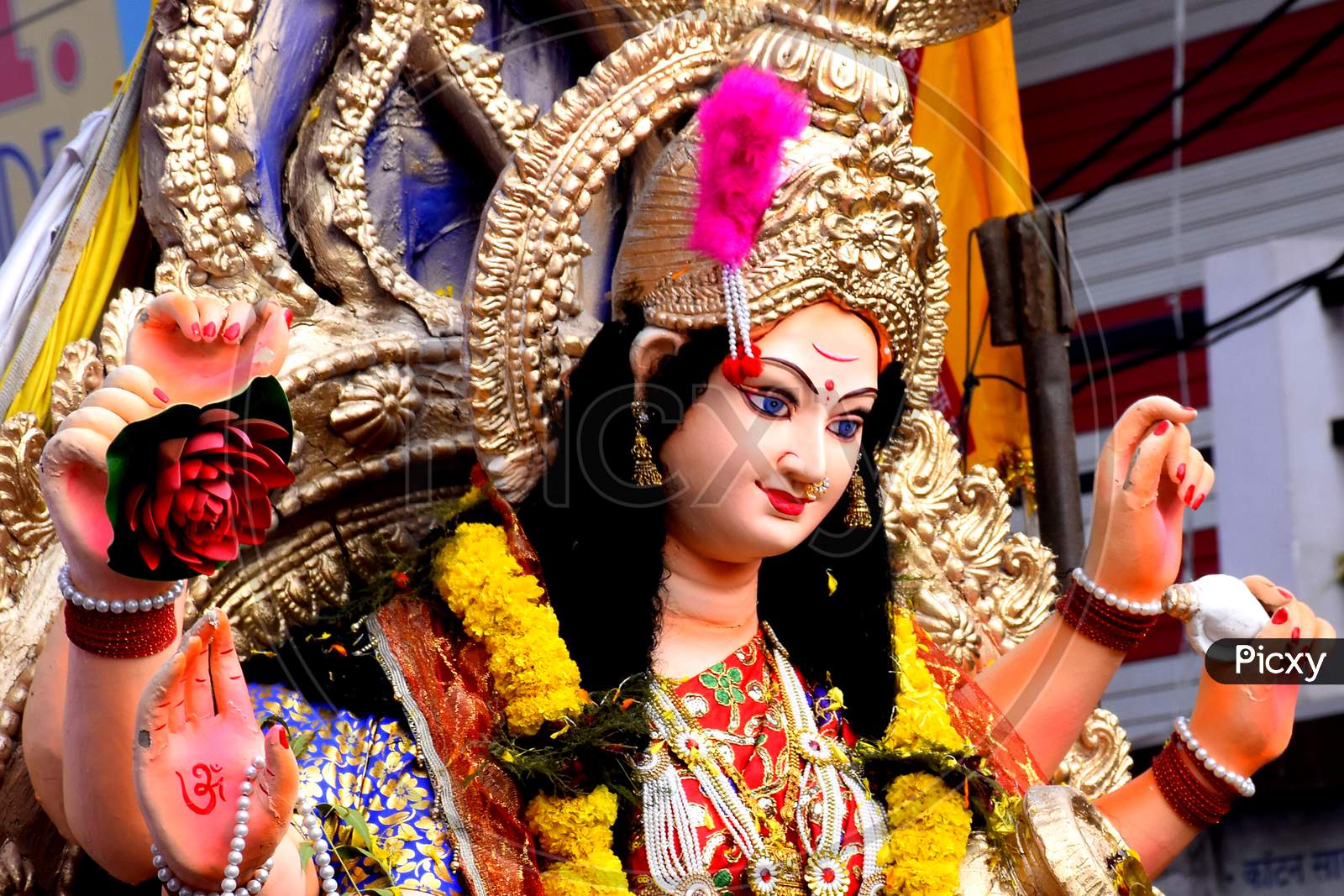 Sculpture Of Hindu Goddess Durga, Goddess Durga Idol With Ornaments In Close Up Side Face View