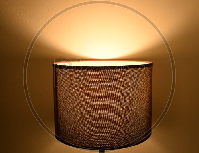 an illuminated table lamp closeup