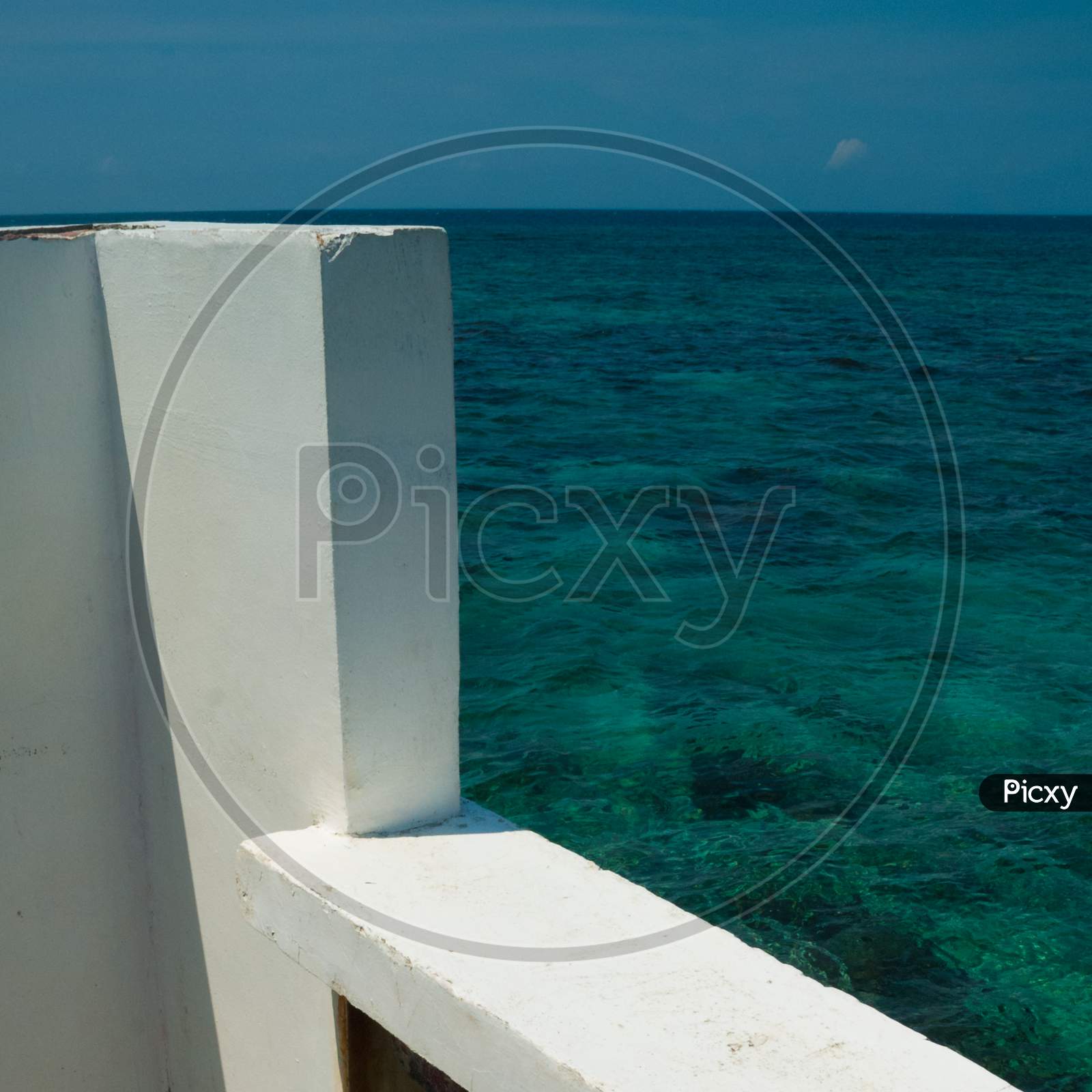 Image of White terrace overlooking the sea horizon-TO042489-Picxy