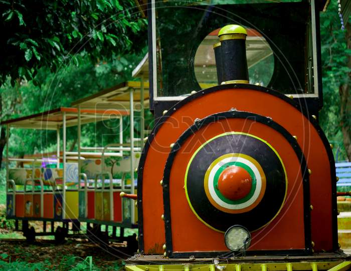 Kids Train Front View At Natural Green Garden Background For Commercial Children Lifestyle Image