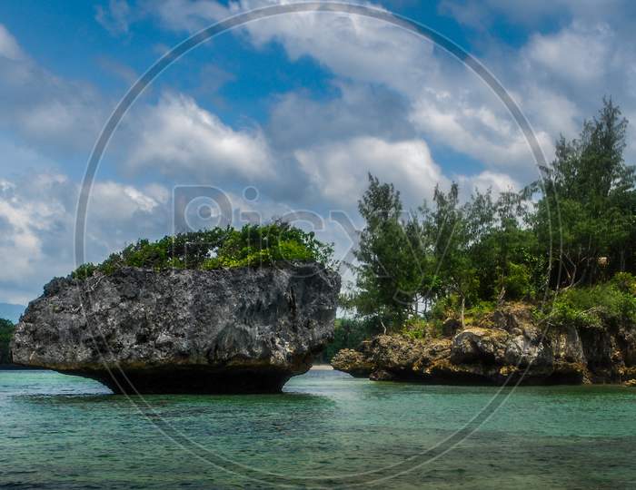 Rock Islands over crystal clear sea water