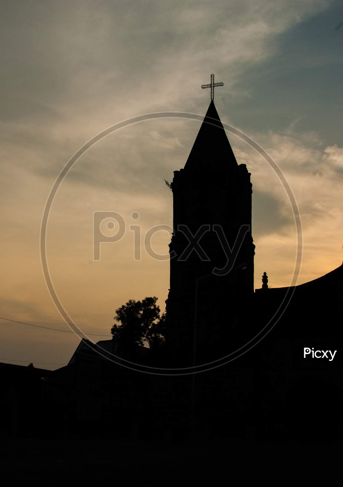 Silhouette of an old stone church