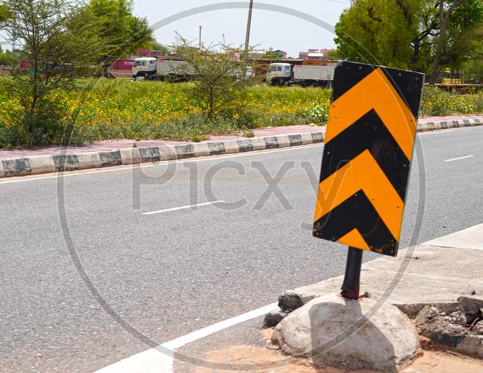 Road Signs And Symbols Concept. Attractive Sign Board With To Go Forward On The Road.