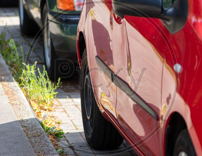 Crashed and dented car door is totally demolished after a heavy car accident with a write-off for the car insurance or repair needs with hit-and-run after collision for car insurance in traffic injury
