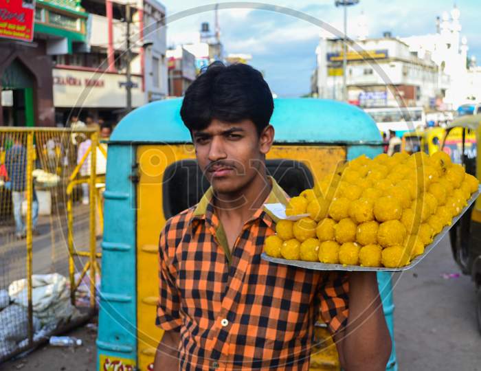 Laddoos being transported