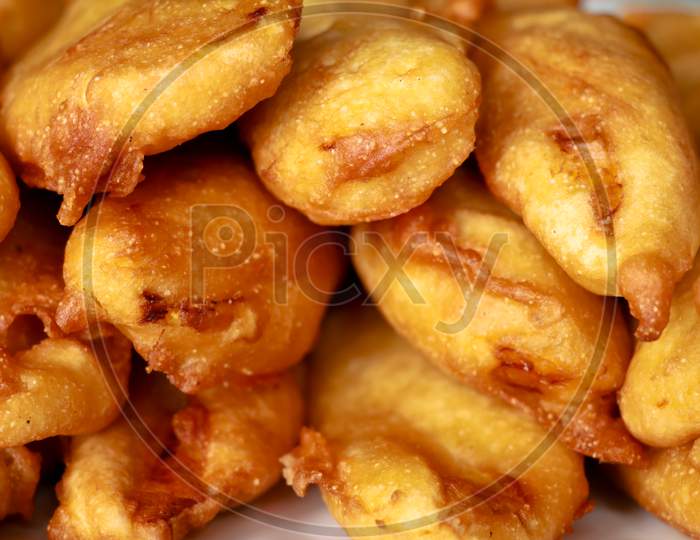 Pazhampori, A Traditional Kerala Tea Time Snack Made Of Maida And Sliced Ripe Banana, Selective Focus