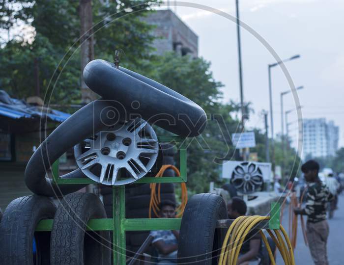 9Th August 2021, Kolkata, West Bengal, India: A Tyre Repair Shop Placed Few Tubes As Symbol Of His Shop.