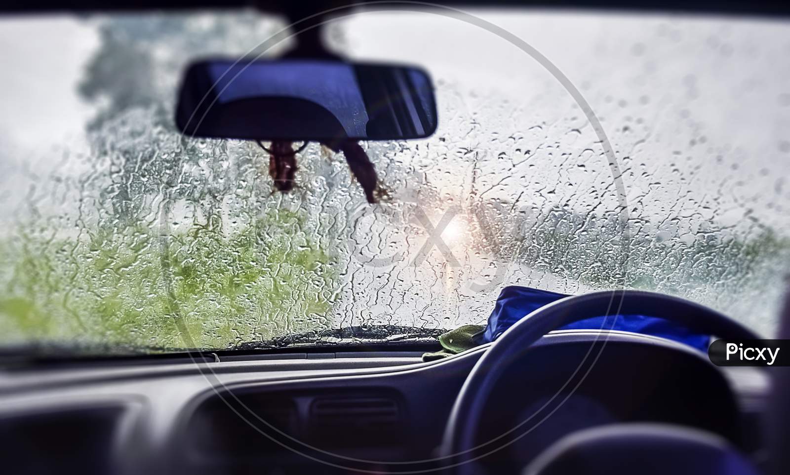 Abstract Capture Of Natural Water Drop On The Window Glass From Inside The Car With Condensation During Rainy Day Traveling On Drive By Road. Asansol, India, Asia, 13Th July 2021.