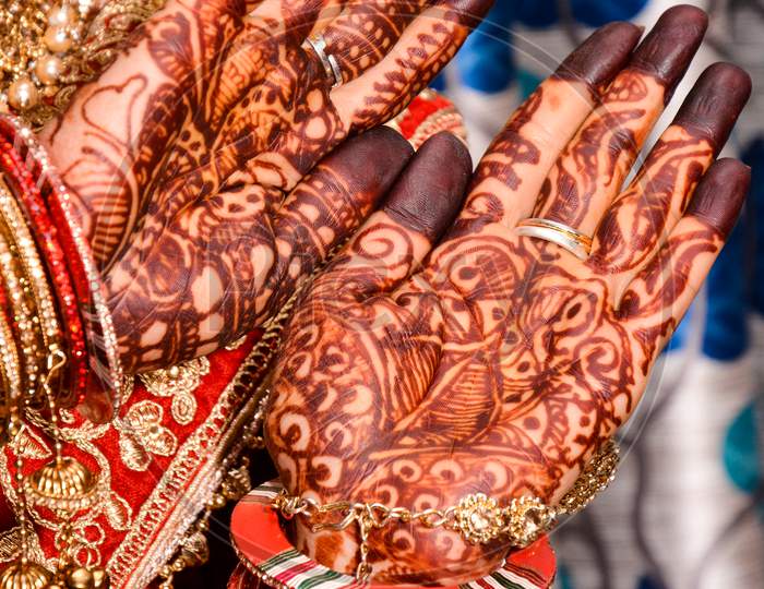 Indian Bride Showing Hands Mehndi Design