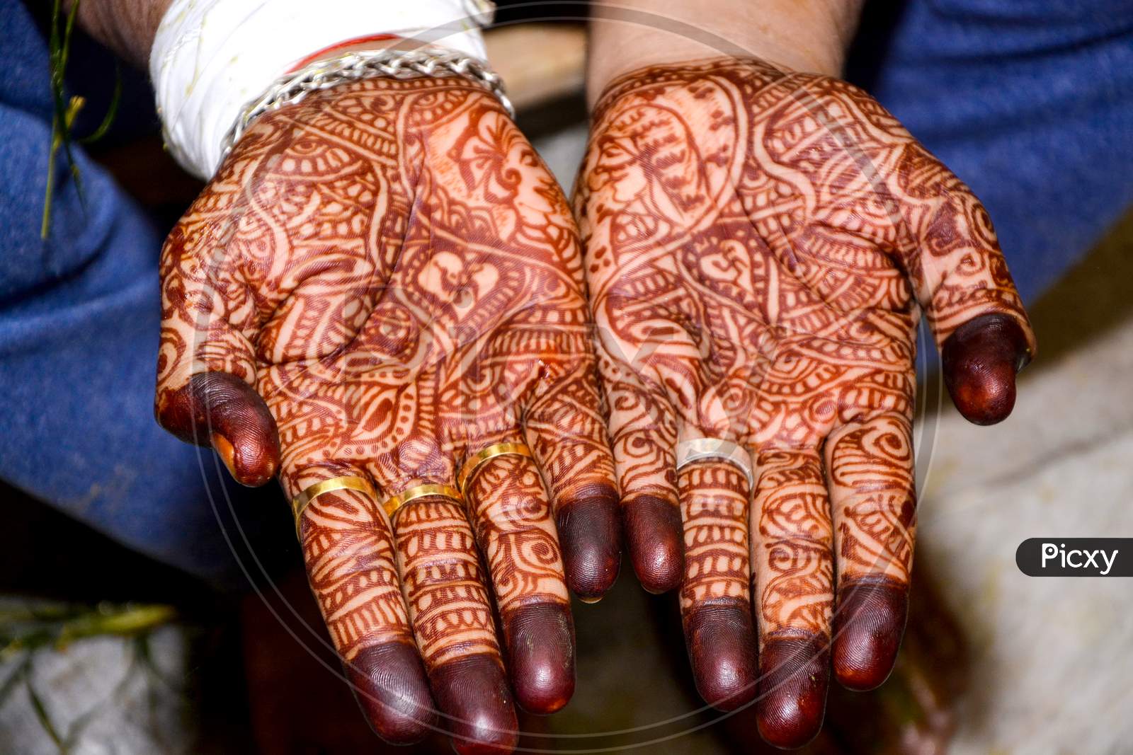 Beautiful Artwork Of Henna Mehndi On Fair Hands Of Indian Groom