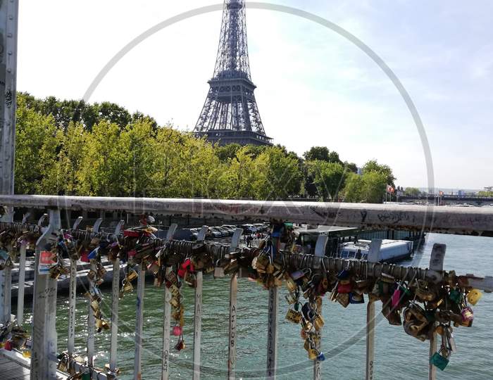 Eiffel tower behind the love locks