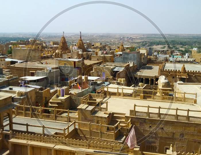 A view of the Jaisalmer city from the top of the Jaisalmer Fort during Day time.
