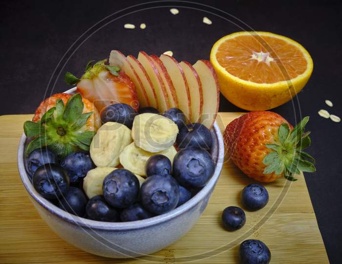 Bowl Of colorful Fruits. Healthy Breakfast With Fresh Fruits.