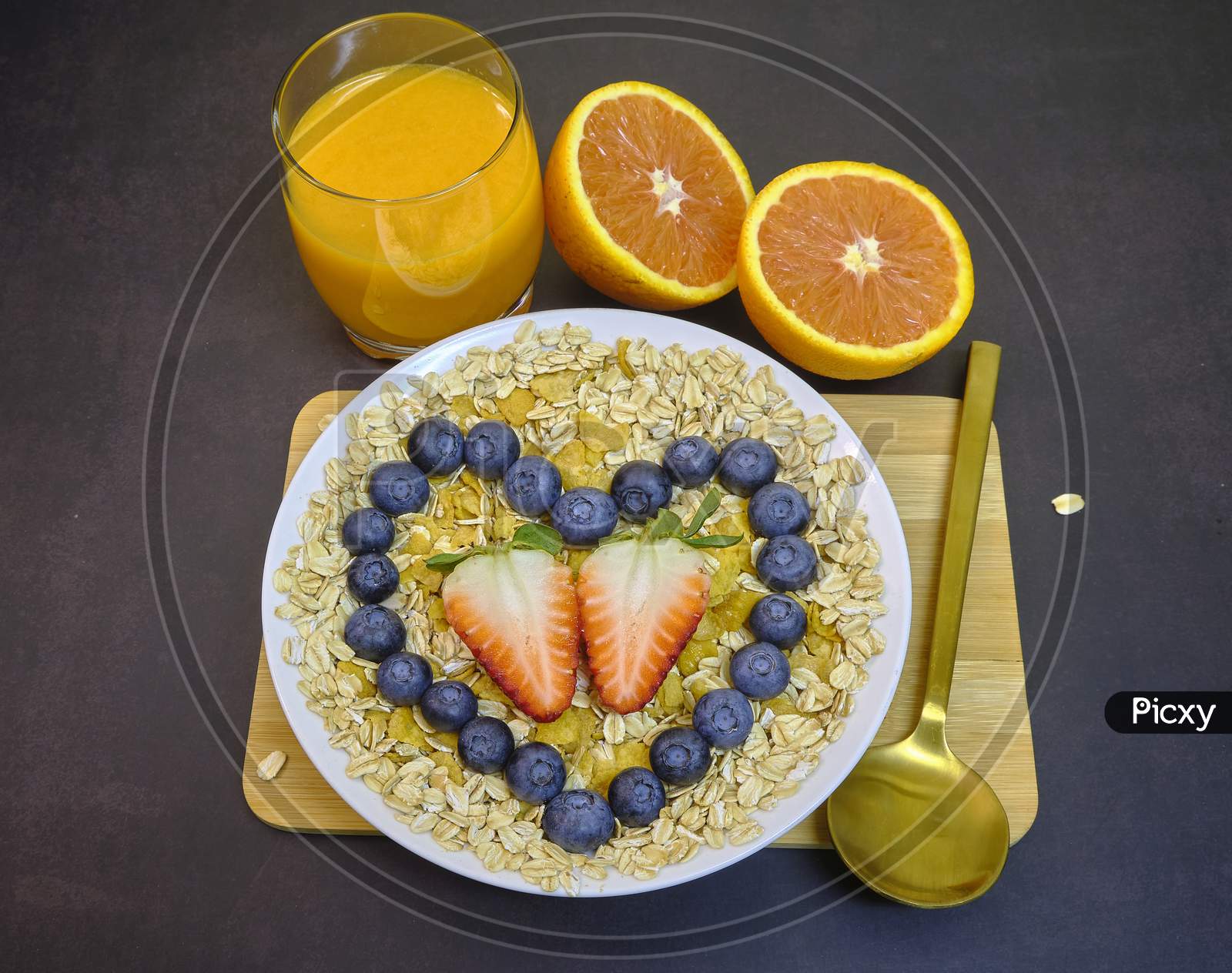 Healthy Breakfast With Fresh Fruits. Bowl Of Colorful Fruits With Love.