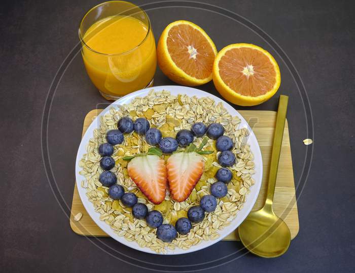 Healthy Breakfast With Fresh Fruits. Bowl Of Colorful Fruits With Love.