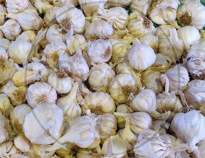 Close-up Pile Of Organic Garlic