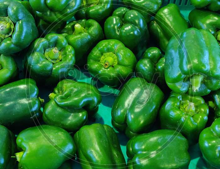 Pile of fresh green capsicum