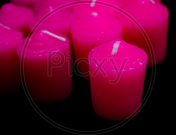 Pink Candles in black background