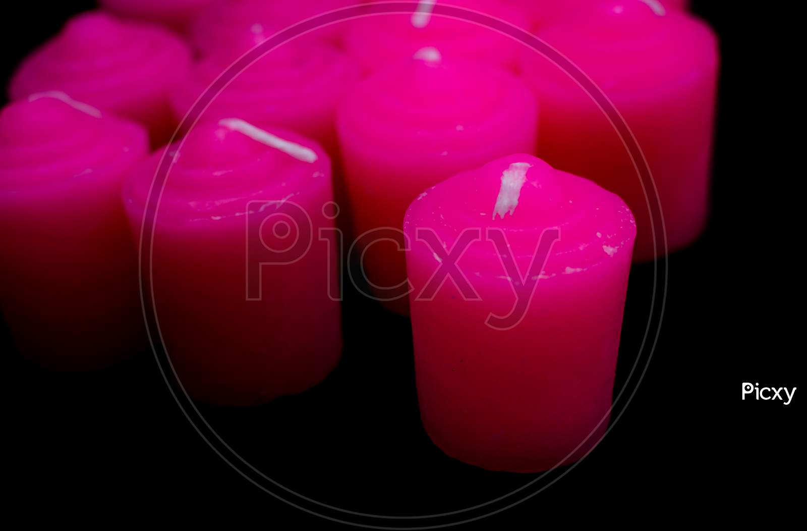 Pink Candles in black background