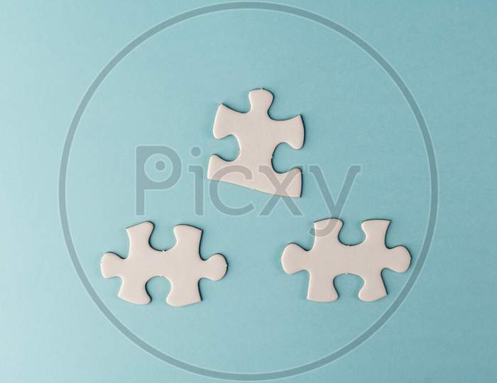 Pieces Of White Jigsaw Puzzle