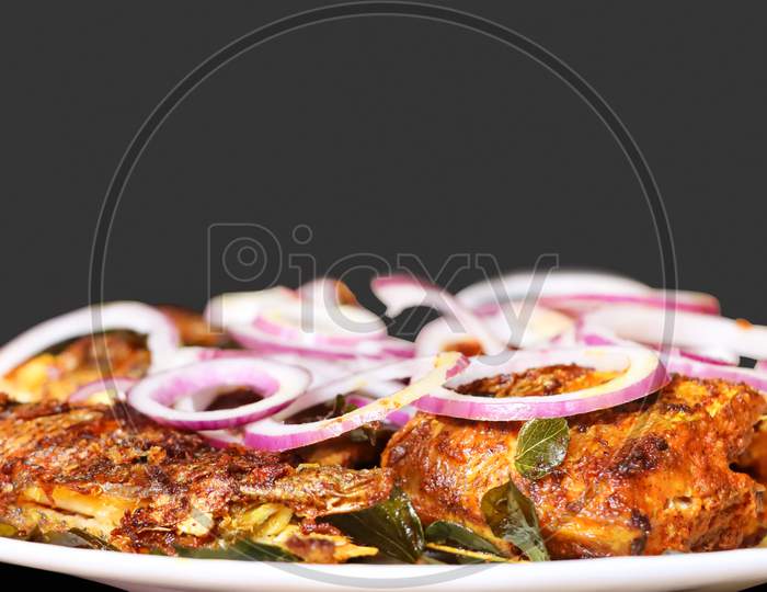 Kerala Style Colorful Fish Fry Inside White Plate