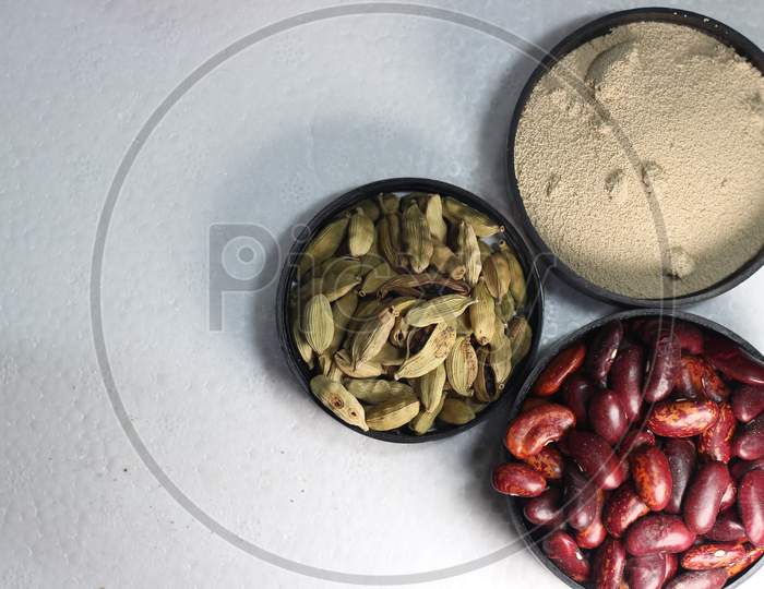 Cereals And Spices On White Background With Copy Space