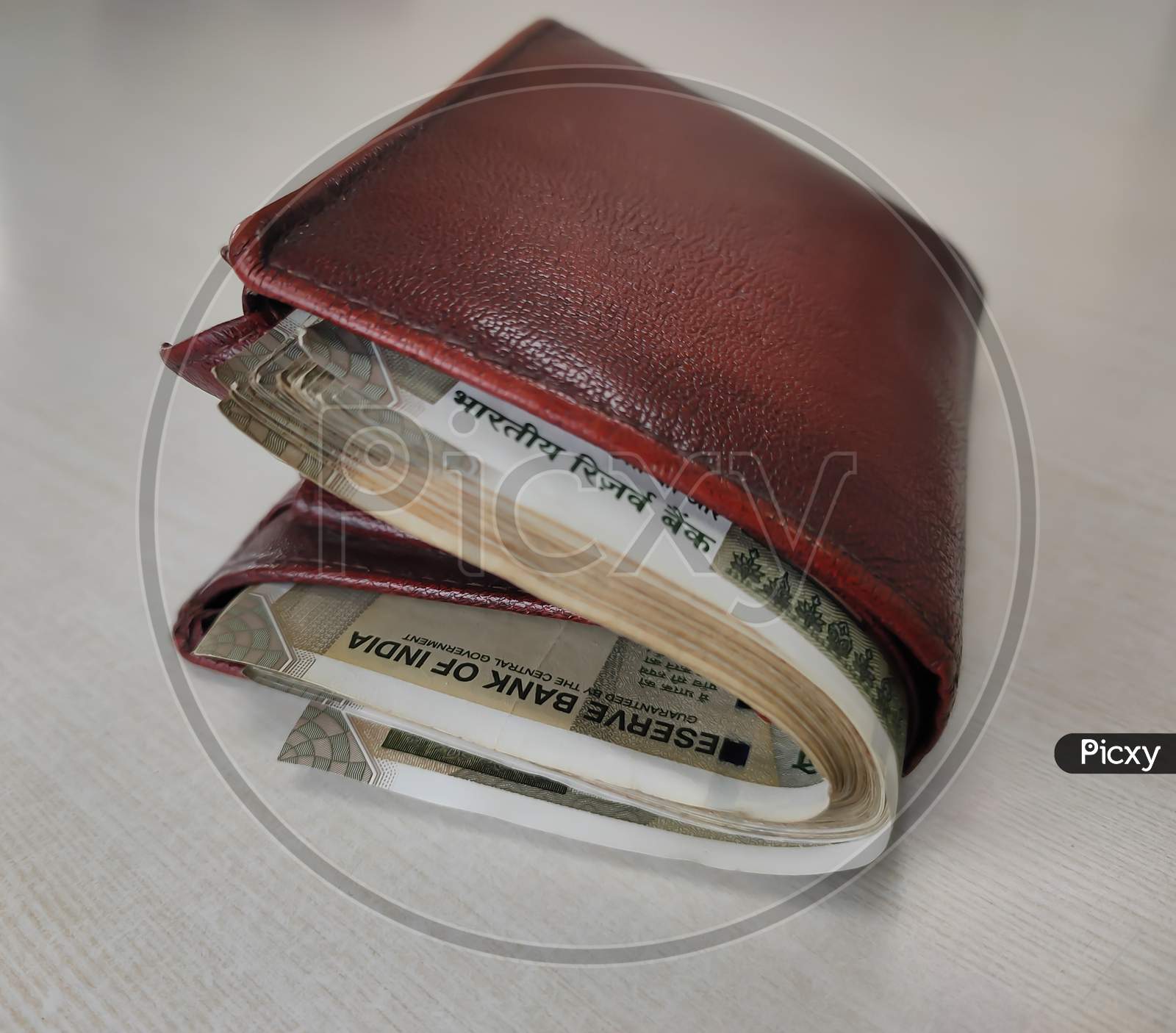 Image of Money Bag Or Gents Wallet Full Of 500 Rupees Cash