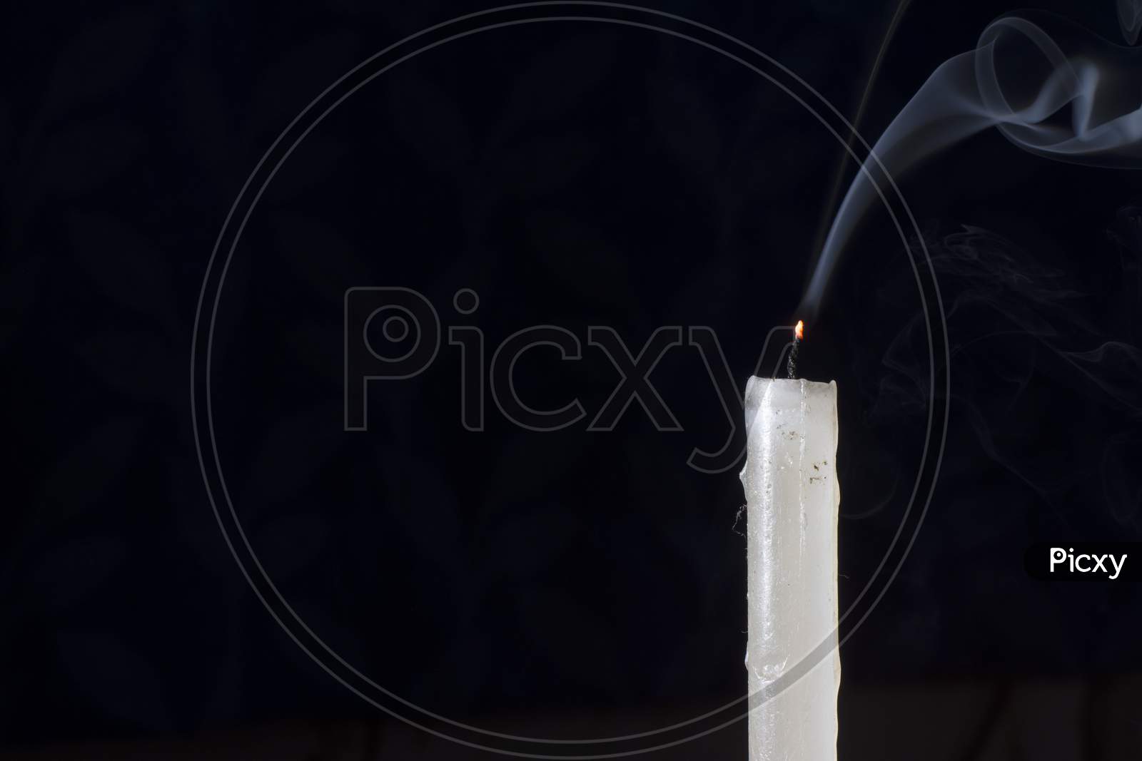 A Candle Without Light With Smoke Line In Dark. Concept Of Hopelessness And End Of Life With Selective Focus