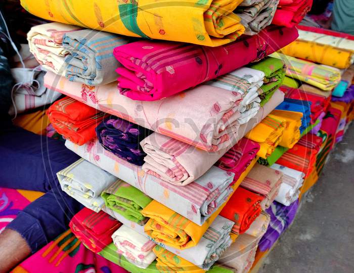 Indian women dress, sari Or saree in display of market.