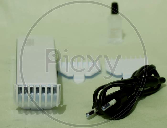 Electronic Shaving Trimming Tool Equipment Kit Presented On White Background.
