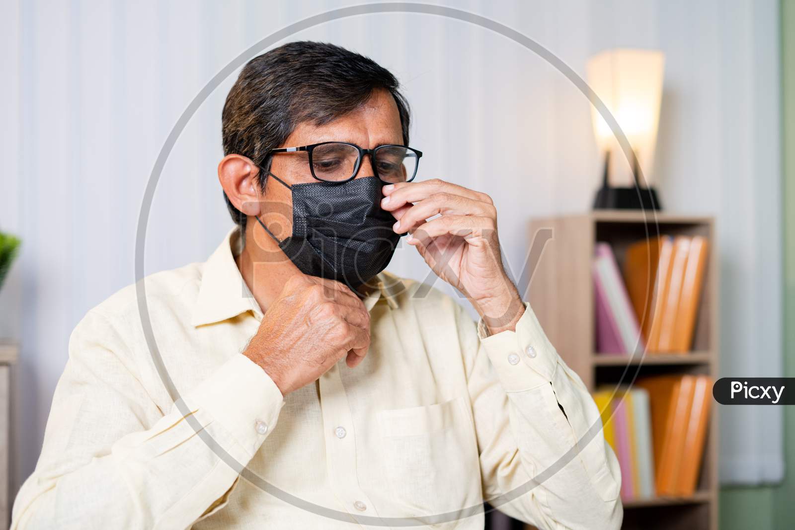 Businessman Wearing Mask While At Office Before Starting Work Due To Coronavirus Covid Pandemic - Concept Of New Normal,Work From Home, Healthcare And Medical.