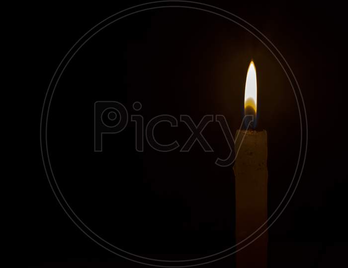 A Candle With Light In Dark. Concept Of Hope With Selective Focus