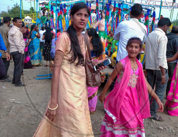 Two girls in market.
