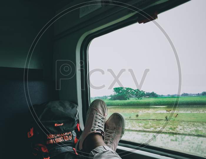 Solo travel in train enjoying the view