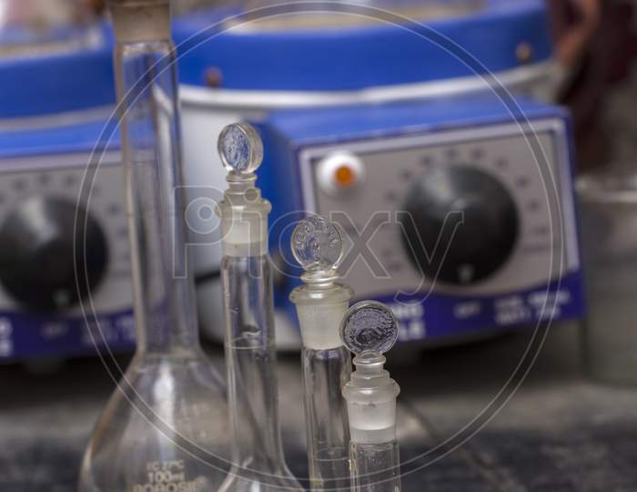 Different Types Of Testing Jars Or Tubes In A Laboratory.