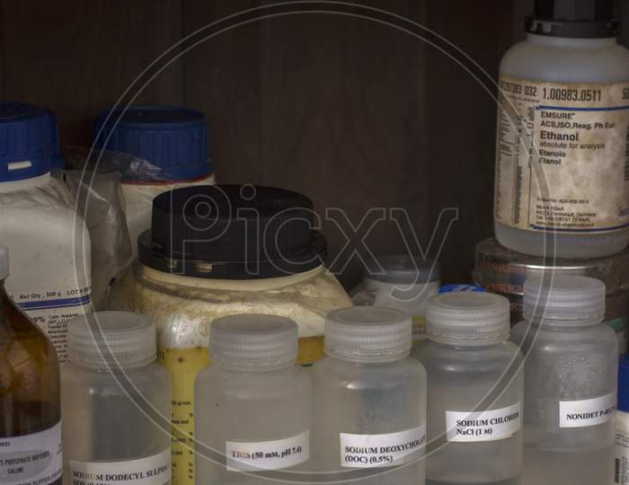 Different Types Of Bottles Of Solutions For Laboratory Tests With Selective Focus.
