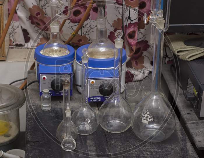 Different Types Of Testing Jars Or Tubes In A Laboratory.