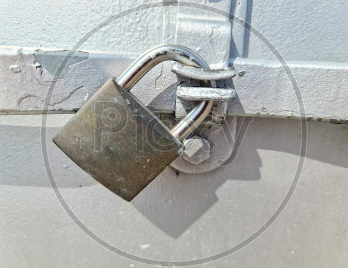 Close Uo Of A Lock At A Close Metal Door