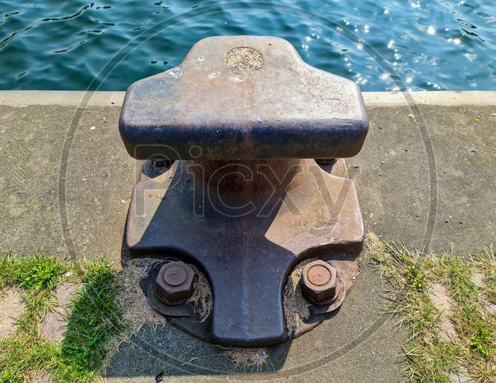 Different Bollards In Front Of The Water At The Port Of Kiel.