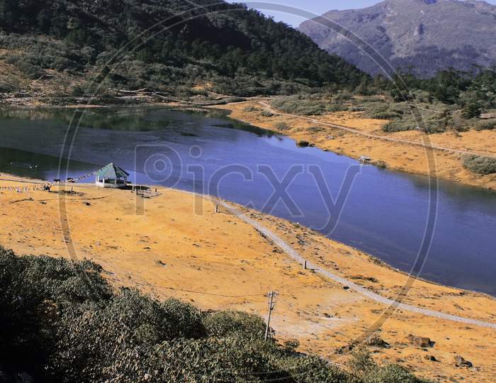beautiful pt tso lake or penga teng tso lake surrounded by alpine meadow and himalayan foothills in tawang, arunachal pradesh in north east india