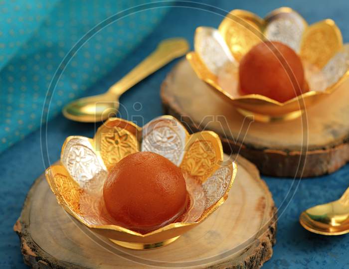 Indian Sweet Food Gulab Jamun In A Traditional Metal Bowl